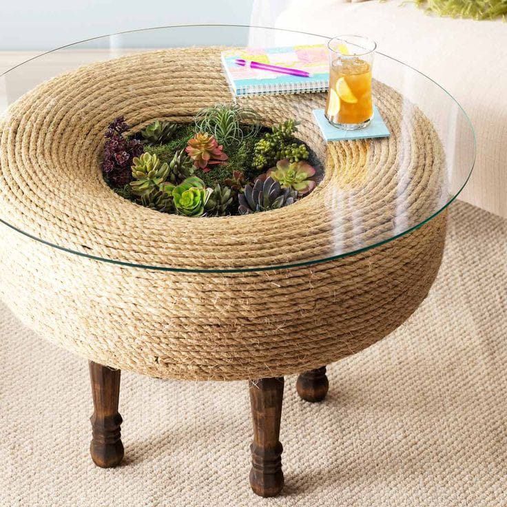 Tyre Ottoman with Hessian rope, glass top, pine legs and succulents